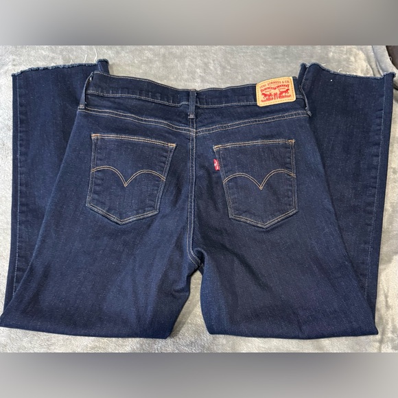 Levi's Slimming Slim Raw Hem Dark Jeans - Picture 3 of 8